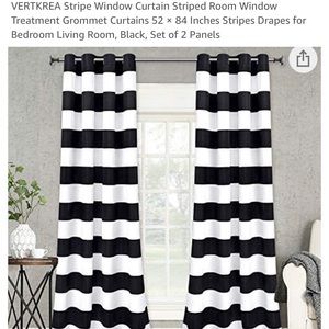 Like new black and white striped curtains.